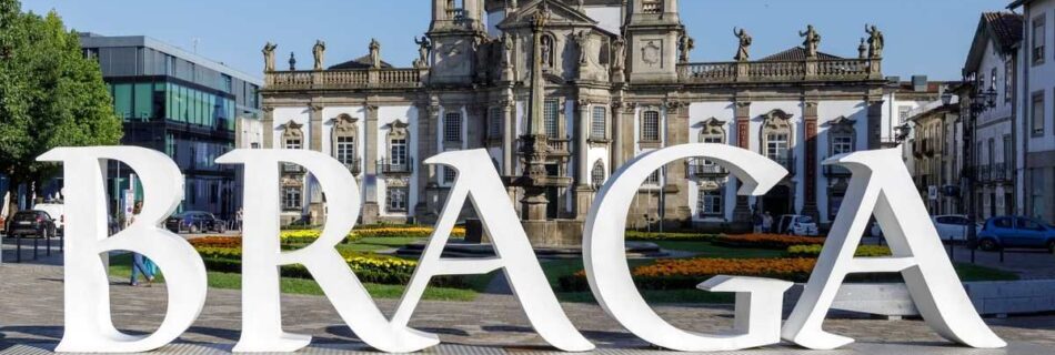 Giant BRAGA letters in front of a baroque church in Braga