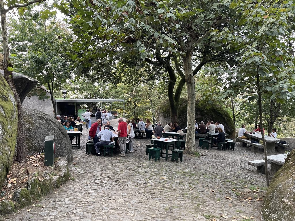 Shaded terrace of Adega do Ermitão on Penha mountain